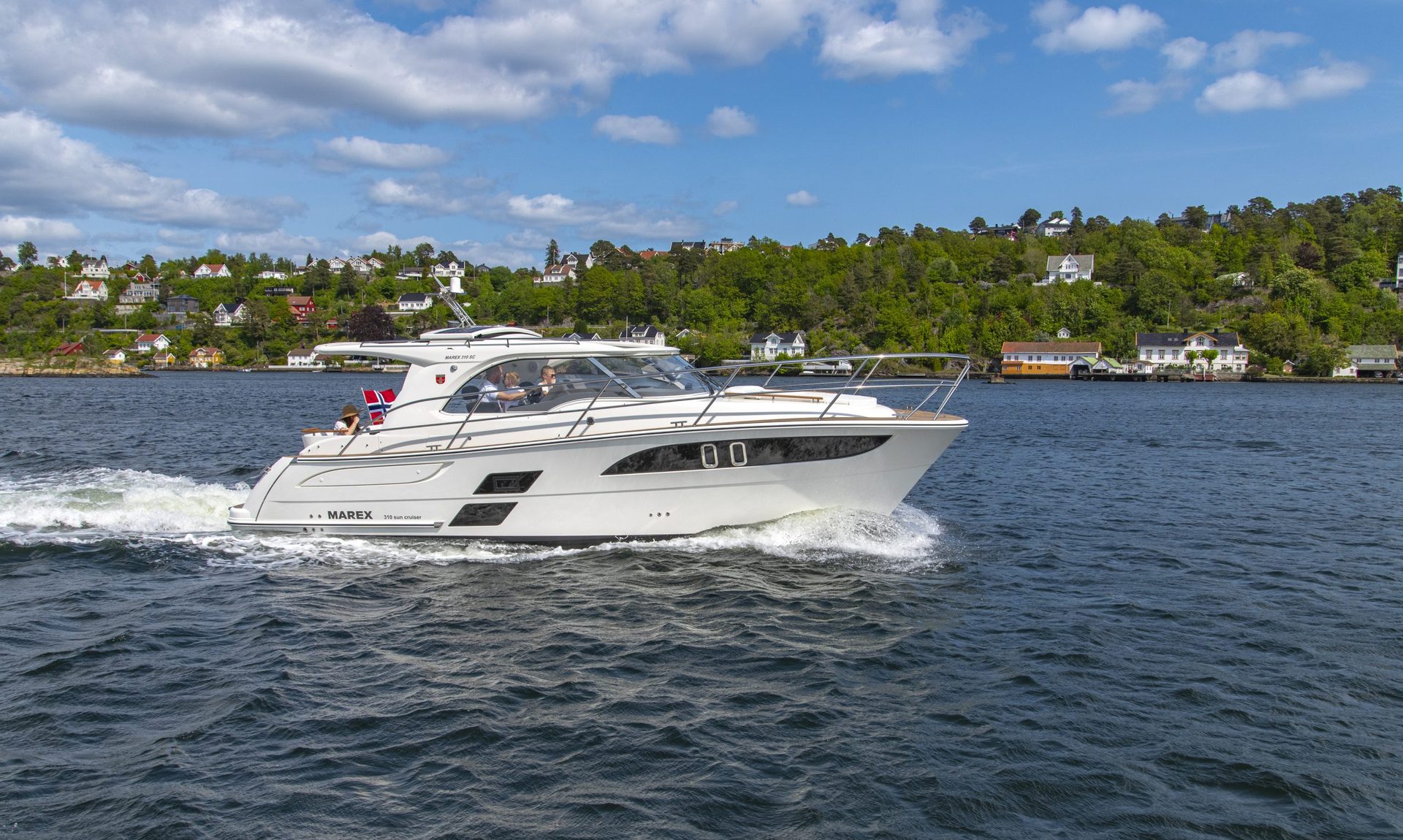 Family using a Marex cruiser